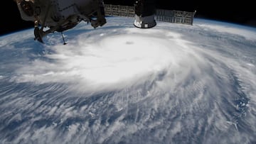 This NASA handout photo released August 30, 2020 shows Hurricane Laura  pictured on August 26, 2020 in the afternoon off the coast of the Texas-Louisiana border as the International Space Station orbited above the Gulf of Mexico. - US President Donald Tru