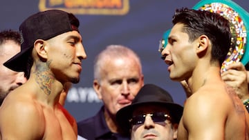 LAS VEGAS, NEVADA - FEBRUARY 20: (L-R) WBC welterweight champion Mario Barrios and Ryan Garcia face off during the ceremonial weigh-in at T-Mobile Arena on February 20, 2026 in Las Vegas, Nevada. Barrios is scheduled to defend his title against Garcia on February 21. Steve Marcus/Getty Images/AFP (Photo by Steve Marcus / GETTY IMAGES NORTH AMERICA / Getty Images via AFP)