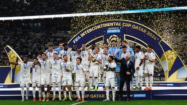 Soccer Football - Intercontinental Cup - Final - Real Madrid v Pachuca - Lusail Stadium, Lusail, Qatar - December 18, 2024 Real Madrid's Luka Modric lifts the trophy as he celebrates with teammates after winning the Intercontinental Cup REUTERS/Rula Rouhana