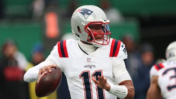 Dec 28, 2025; East Rutherford, New Jersey, USA; New England Patriots quarterback Joshua Dobbs (11) passes against the New York Jets during the fourth quarter of the game at MetLife Stadium. Mandatory Credit: Vincent Carchietta-Imagn Images