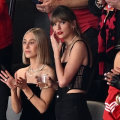 Taylor Swift surprises as she chugs a beer on the jumbotron at Super Bowl 2024