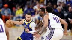 SAN FRANCISCO, CALIFORNIA - APRIL 28: Stephen Curry #30 of the Golden State Warriors is guarded by Harrison Barnes #40 and Trey Lyles #41 of the Sacramento Kings in the second half of Game Six of the Western Conference First Round Playoffs at Chase Center on April 28, 2023 in San Francisco, California. NOTE TO USER: User expressly acknowledges and agrees that, by downloading and or using this photograph, User is consenting to the terms and conditions of the Getty Images License Agreement.   Ezra Shaw/Getty Images/AFP (Photo by EZRA SHAW / GETTY IMAGES NORTH AMERICA / Getty Images via AFP)