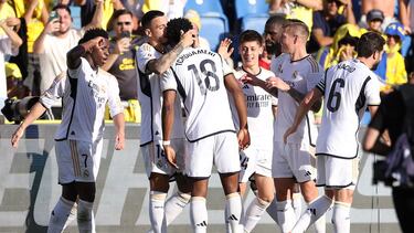 Real Madrid's French defender #18 Aurelien Tchouameni celebrates with teammates after scoring his team's second goal during the Spanish league football match between UD Las Palmas and Real Madrid CF at the Gran Canaria stadium in Las Palmas de Gran Canaria on January 27, 2024. (Photo by Thomas COEX / AFP)