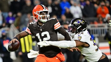 Nov 16, 2025; Cleveland, Ohio, USA; Cleveland Browns quarterback Shedeur Sanders (12) is sacked by Baltimore Ravens linebacker Trenton Simpson (32) during the fourth quarter at Huntington Bank Field. Mandatory Credit: Ken Blaze-Imagn Images