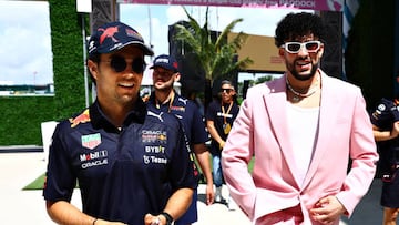 MIAMI, FLORIDA - MAY 08: Sergio Perez of Mexico and Oracle Red Bull Racing walks in the Paddock with Bad Bunny prior to the F1 Grand Prix of Miami at the Miami International Autodrome on May 08, 2022 in Miami, Florida. (Photo by Mark Thompson/Getty Images)