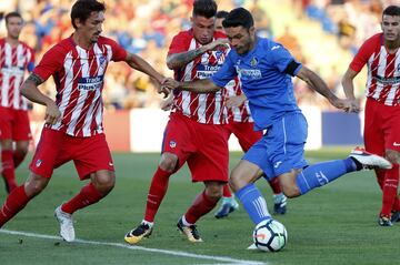 Savic, Giménez and Jorge Molina.