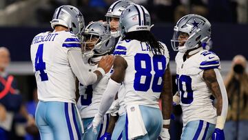 ARLINGTON, TEXAS - NOVEMBER 30:  Wide receiver Brandin Cooks #3 of the Dallas Cowboys is congratulated by quarterback Dak Prescott #4, wide receiver CeeDee Lamb #88 and running back Tony Pollard #20 after making a catch for a touchdown during the 2nd quarter of the game against the Seattle Seahawks at AT&T Stadium on November 30, 2023 in Arlington, Texas. (Photo by Ron Jenkins/Getty Images)