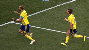 Nizhny Novgorod (Russian Federation), 18/06/2018.- Andreas Granqvist (L) of Sweden celebrates with his teammate Albin Ekdal (R) after scoring the 1-0 lead from the penalty spot during the FIFA World Cup 2018 group F preliminary round soccer match between