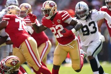 Aug 29, 2021; Santa Clara, California, USA; San Francisco 49ers running back Wayne Gallman (22) runs the ball against the Las Vegas Raiders in the fourth quarter at Levi's Stadium. Mandatory Credit: Cary Edmondson-USA TODAY Sports