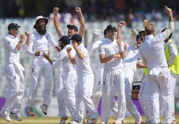 England's players celebrate after beating Bangladesh