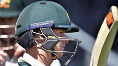 Steve Smith captain of Australia waits to walk on the field after lunch during day five of the second cricket Test match between New Zealand and Australia at the Hagley Park in Christchurch on February 24, 2016.