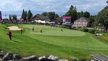 People watch competitors during the Amundi Evian Championship in the French Alps town of Evian-les-Bains, a major tournament on the women&#039;s calendar, on July 25, 2021. (Photo by PHILIPPE DESMAZES / AFP)