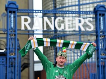 GLASGOW, SCOTLAND - DECEMBER 31: A Celtic fan poses outside Ibrox Stadium ahead of the start of the Scottish Premiership match between Rangers FC and Celtic FC at Ibrox Stadium on December 31, 2016 in Glasgow, Scotland. (Photo by Mark Runnacles/Getty Imag