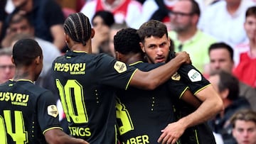 CORRECTION / Feyenoord's Argentinian forward Santiago Gimenez (R) celebrates scoring a goal during the Dutch Eredivisie match between Ajax Amsterdam and Feyenoord at the Johan Cruijff ArenA in Amsterdam on September 24, 2023. (Photo by Olaf Kraak / ANP / AFP) / Netherlands OUT / �The erroneous mention[s] appearing in the metadata of this photo by Olaf Kraak has been modified in AFP systems in the following manner: [Feyenoord] instead of [Ajax]. Please immediately remove the erroneous mention[s] from all your online services and delete it (them) from your servers. If you have been authorized by AFP to distribute it (them) to third parties, please ensure that the same actions are carried out by them. Failure to promptly comply with these instructions will entail liability on your part for any continued or post notification usage. Therefore we thank you very much for all your attention and prompt action. We are sorry for the inconvenience this notification may cause and remain at your disposal for any further information you may require.�