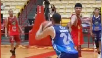 This basketball player utterly bamboozled his opponent with an outrageous piece of ball handling, before sinking a three-pointer that hit nothing but net.