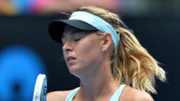 María Sharapova se muestra disgustada tras su eliminación en octavos de final.