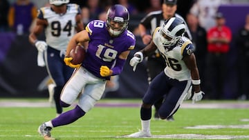 MINNEAPOLIS, MN - NOVEMBER 19: Adam Thielen #19 of the Minnesota Vikings runs with the ball and evades defender Dominique Hatfield #36 of the Los Angeles Rams of the game on November 19, 2017 at U.S. Bank Stadium in Minneapolis, Minnesota. Thielen scored a 65 yard touchdown on the play.   Adam Bettcher/Getty Images/AFP
 == FOR NEWSPAPERS, INTERNET, TELCOS &amp; TELEVISION USE ONLY ==