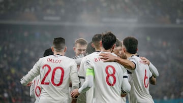 Diogo Dalot and Kobbie Mainoo scored the goals as Manchester United sealed their place in the Europa League last 16.