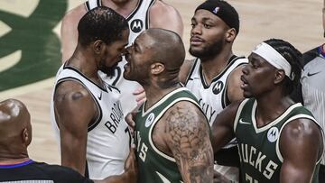 Jun 10, 2021; Milwaukee, Wisconsin, USA; Milwaukee Bucks forward P.J. Tucker (17) yells in the face of Brooklyn Nets forward Kevin Durant (7) in the third quarter during game three in the second round of the 2021 NBA Playoffs at Fiserv Forum. Mandatory Credit: Benny Sieu-USA TODAY Sports