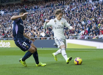 Luka Modric and Javi Moyano.