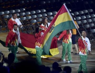 The Bolivia team enters the stadium during the opening ceremony for the 2015 Pan American Games at the Rogers Centre in Toronto, Ontario, on July 10, 2015. AFP PHOTO/OMAR TORRES