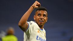 Real Madrid's Brazilian forward Rodrygo celebrates after scoring a goal during the UEFA Champions League semi-final second leg football match between Real Madrid CF and Manchester City at the Santiago Bernabeu stadium in Madrid on May 4, 2022. (Photo by GABRIEL BOUYS / AFP)