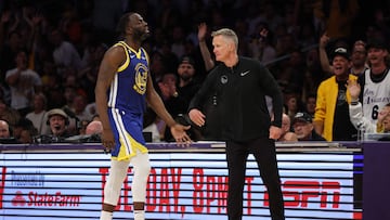 LOS ANGELES, CALIFORNIA - MAY 12: Draymond Green #23 of the Golden State Warriors high fives head coach Steve Kerr during the fourth quarter against the Los Angeles Lakers in game six of the Western Conference Semifinal Playoffs at Crypto.com Arena on May 12, 2023 in Los Angeles, California. NOTE TO USER: User expressly acknowledges and agrees that, by downloading and or using this photograph, User is consenting to the terms and conditions of the Getty Images License Agreement.   Harry How/Getty Images/AFP (Photo by Harry How / GETTY IMAGES NORTH AMERICA / Getty Images via AFP)