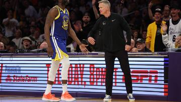 LOS ANGELES, CALIFORNIA - MAY 12: Draymond Green #23 of the Golden State Warriors high fives head coach Steve Kerr during the fourth quarter against the Los Angeles Lakers in game six of the Western Conference Semifinal Playoffs at Crypto.com Arena on May 12, 2023 in Los Angeles, California. NOTE TO USER: User expressly acknowledges and agrees that, by downloading and or using this photograph, User is consenting to the terms and conditions of the Getty Images License Agreement.   Harry How/Getty Images/AFP (Photo by Harry How / GETTY IMAGES NORTH AMERICA / Getty Images via AFP)