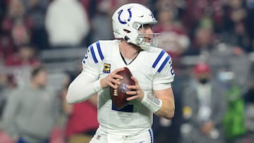 Dec 25, 2021; Glendale, Arizona, USA; Indianapolis Colts quarterback Carson Wentz (2) drops back to pass against the Arizona Cardinals during the first half at State Farm Stadium. Mandatory Credit: Joe Camporeale-USA TODAY Sports