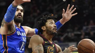 Jan 20, 2018; Cleveland, OH, USA; Cleveland Cavaliers guard Derrick Rose (1) drives against Oklahoma City Thunder center Steven Adams (12) in the fourth quarter at Quicken Loans Arena. Mandatory Credit: David Richard-USA TODAY Sports