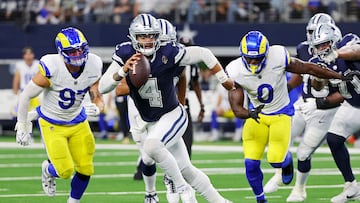 ARLINGTON, TEXAS - OCTOBER 29: Dak Prescott #4 of the Dallas Cowboys scrambles with the ball in the second quarter of a game against the Los Angeles Rams at AT&T Stadium on October 29, 2023 in Arlington, Texas. Richard Rodriguez/Getty Images/AFP (Photo by Richard Rodriguez / GETTY IMAGES NORTH AMERICA / Getty Images via AFP)