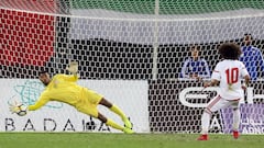Oman&#039;s goalkeeper Fayez al-Rusheidi (L) stops the ball after a penalty by the UAE&#039;s player Omar Abdulrahman during the Gulf Cup of Nations 2017 final football match between Oman and the UAE at the Sheikh Jaber al-Ahmad Stadium in Kuwait City on 