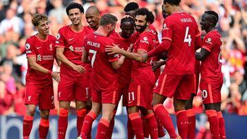 Liverpool&#039;s Guinean midfielder Naby Keita (C) celebrates with teammates after scoring their third goal during the English Premier League football match between Liverpool and Crystal Palace at Anfield in Liverpool, north west England on September 18, 