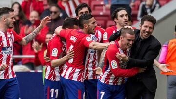 Griezmann y Simeone celebran el gol del francés.