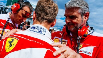 Vettel y Arrivabene.