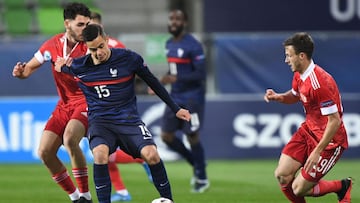 France&#039;s midfielder Romain Faivre (C) vies with Russia&#039;s defender Nair Tiknizyan (L) and Russia&#039;s midfielder Danil Lesovo during the UEFA Under21 Championship group stage football match Russia v France in Szombathely, on March 28, 2021. (Ph