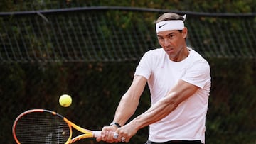 Spain's Rafael Nadal plays a backhand return during a training on the eve of his match during the ATP Barcelona Open "Conde de Godo" tennis tournament, in Barcelona, on April 15, 2024. (Photo by PAU BARRENA / AFP)