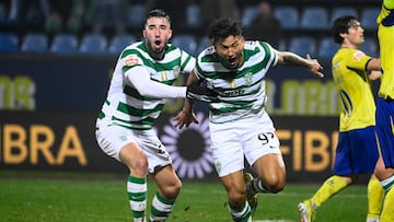 Sporting Lisbon's Colombian forward #97 Luis Suarez (R) celebrates scoring his team's second goal during the Portuguese League football match between FC Arouca and Sporting CP at the Municipal de Arouca stadium in Aveiro on January 24, 2026. (Photo by Miguel RIOPA / AFP)