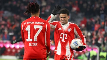 MUNICH, GERMANY - JANUARY 11: Luis Diaz of Bayern Muenchen celebrates the goal 4:1 with Michael Olise of Bayern Muenchen during the Bundesliga match between FC Bayern München and VfL Wolfsburg at Allianz Arena on January 11, 2026 in Munich, Germany. (Photo by Stefan Matzke - sampics/Getty Images)