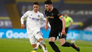 Leeds United's Brazilian-born Spanish striker Rodrigo (L) vies with West Ham United's English midfielder Declan Rice (R) during the English Premier League football match between Leeds United and West Ham United at Elland Road in Leeds, northern