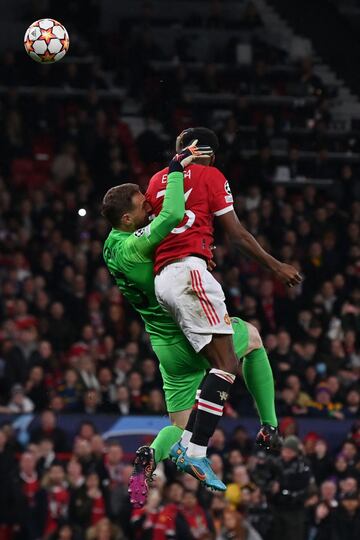 Jan Oblak y Anthony Elanga.