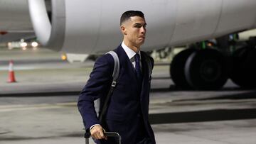 Portugal's forward Cristiano Ronaldo arrives at the Hamad International Airport in Doha on November 18, 2022, ahead of the Qatar 2022 World Cup football tournament. (Photo by Giuseppe CACACE / AFP)