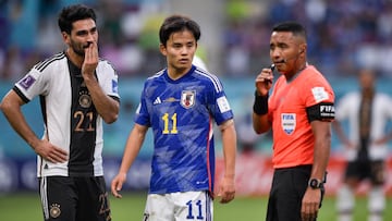 AR-RAYYAN, QATAR - NOVEMBER 23: Ilkay Gundogan of Germany and Takefusa Kubo of Japan during the Group E - FIFA World Cup Qatar 2022 match between Germany and Japan at the Khalifa International Stadium on November 23, 2022 in Ar-Rayyan, Qatar (Photo by Pablo Morano/BSR Agency/Getty Images)