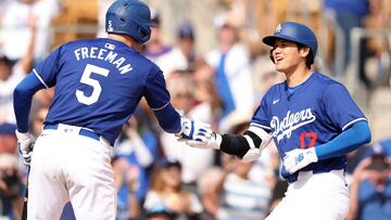 GLENDALE, ARIZONA - FEBRUARY 27: Shohei Ohtani #17 celebrates with Freddie Freeman #5 of the Los Angeles Dodgers after hitting a two-run home run in the fifth inning inning during a game against the Chicago White Sox at Camelback Ranch on February 27, 2024 in Glendale, Arizona.   Christian Petersen/Getty Images/AFP (Photo by Christian Petersen / GETTY IMAGES NORTH AMERICA / Getty Images via AFP)