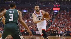May 21, 2019; Toronto, Ontario, CAN; Toronto Raptors center Marc Gasol (33) passes the ball as Milwaukee Bucks guard George Hill (3) defends during game four of the Eastern conference finals of the 2019 NBA Playoffs at Scotiabank Arena. Mandatory Credit: John E. Sokolowski-USA TODAY Sports