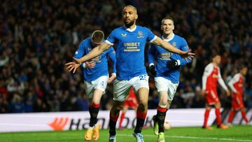 GLASGOW, SCOTLAND - APRIL 14: Kemar Roofe of Rangers celebrates with teammates John Lundstram and Ryan Kent of Rangers after scoring their team's third goal during the UEFA Europa League Quarter Final Leg Two match between Rangers FC and Sporting Bra
