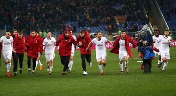 AC Milan players celebrate victory in Rome