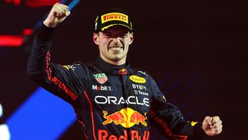 JEDDAH, SAUDI ARABIA - MARCH 27: Race winner Max Verstappen of the Netherlands and Oracle Red Bull Racing celebrates on the podium during the F1 Grand Prix of Saudi Arabia at the Jeddah Corniche Circuit on March 27, 2022 in Jeddah, Saudi Arabia. (Photo by