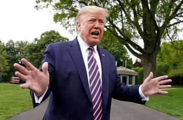 FILE PHOTO: U.S. President Donald Trump speaks to reporters as he departs on travel to Phoenix, Arizona from the South Lawn of the White House in Washington, U.S., May 5, 2020. REUTERS/Kevin Lamarque/File Photo