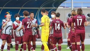Kobe's midfielder Andres Iniesta (L) celebrates with his teammates after their win in the AFC Champions League round of 16 football match between Japan's Vissel Kobe and China's Shanghai SIPG on December 7, 2020 at the Khalifa International